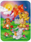 Colorful illustration of animals playing with a kite in a garden setting.