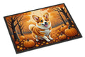 Doormat with a corgi and pumpkins design on an autumn-themed background