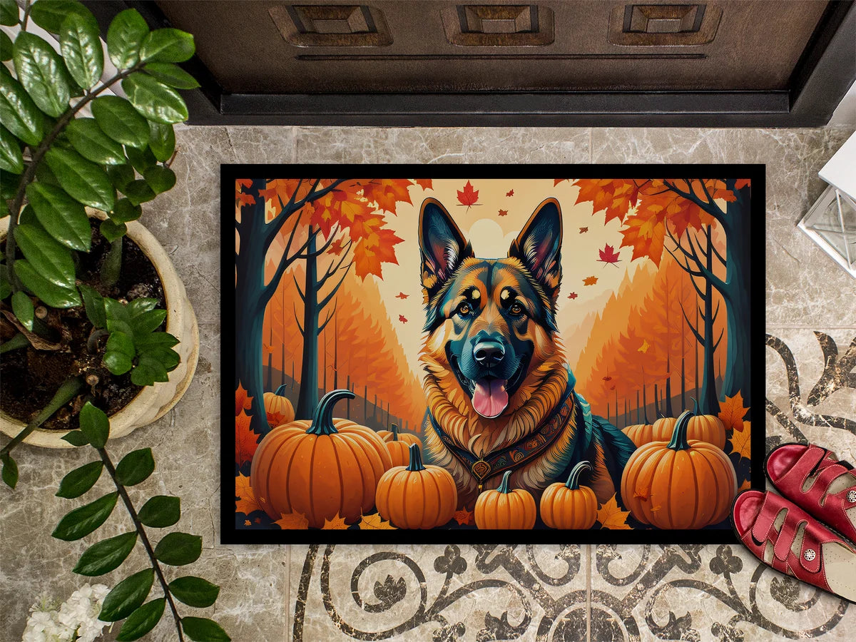 Decorative doormat with a German Shepherd and pumpkins design on a patterned floor.