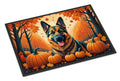 Decorative mat with a dog and pumpkins in an autumn-themed design