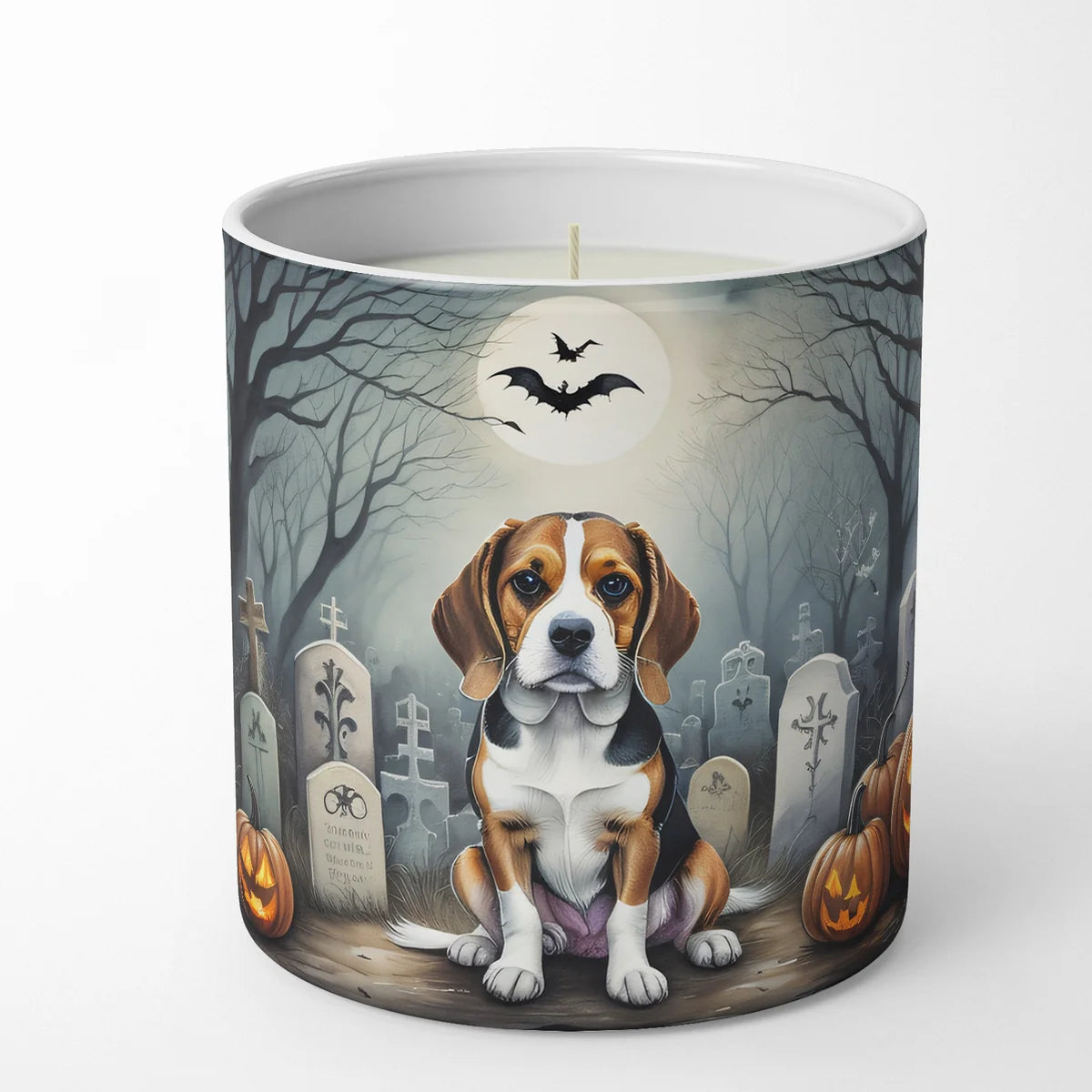 Candle with a Halloween-themed design featuring a dog, pumpkins, and bats on a white background.