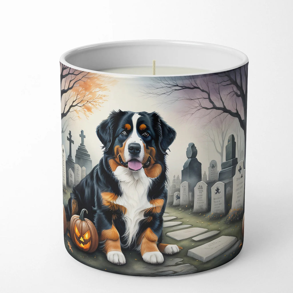 Candle with a dog and Halloween-themed design on a white background