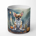 Candle with a dog and Halloween-themed design on a white background