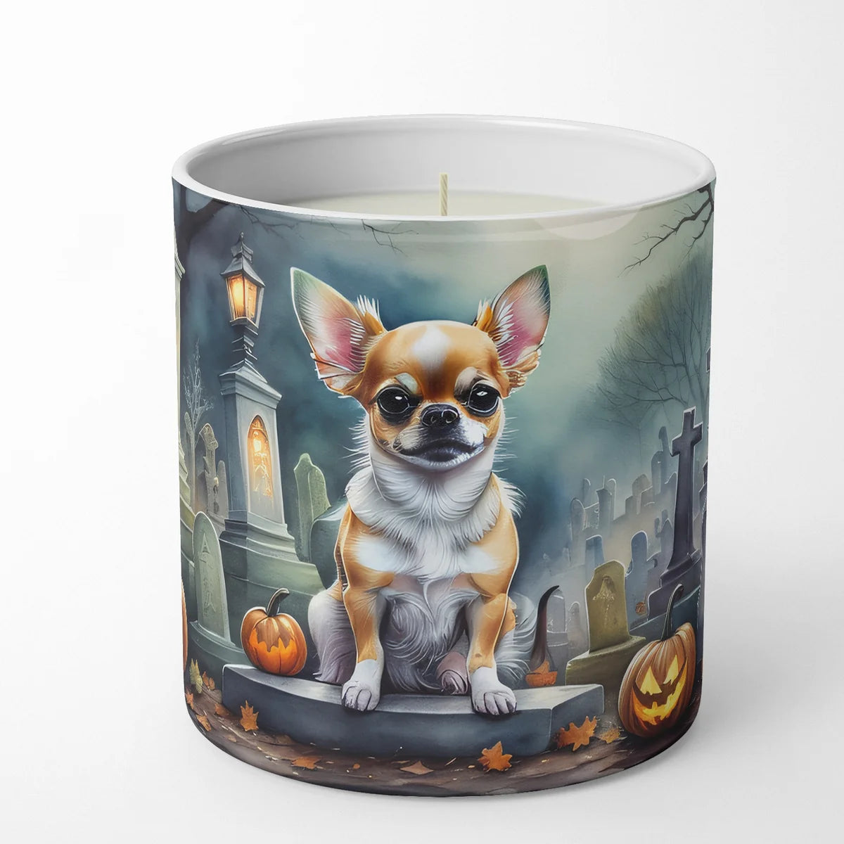 Candle with a dog and Halloween-themed design on a white background