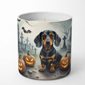 Candle with a dachshund and Halloween pumpkins design on a white background