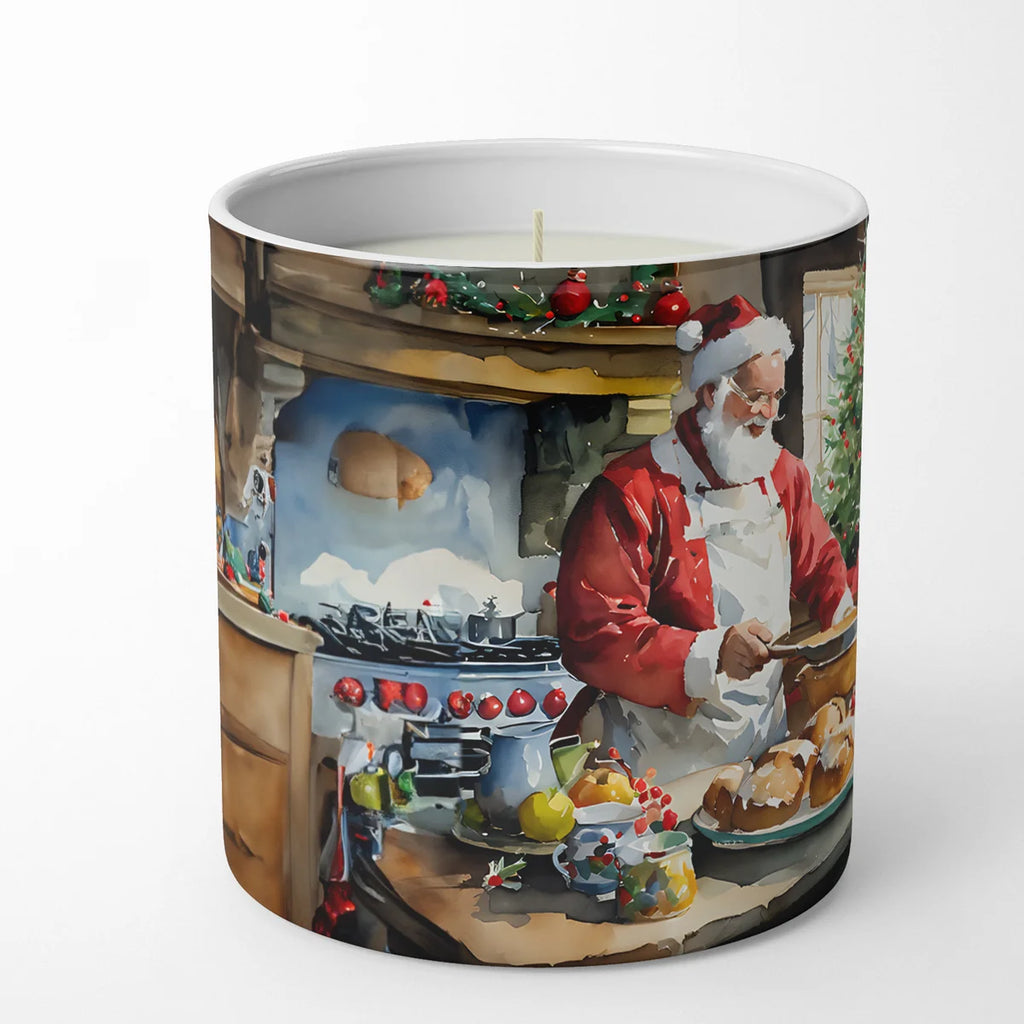 A white ceramic candle jar featuring a detailed watercolor-style Christmas illustration of Santa Claus in a kitchen, set against a plain white background.