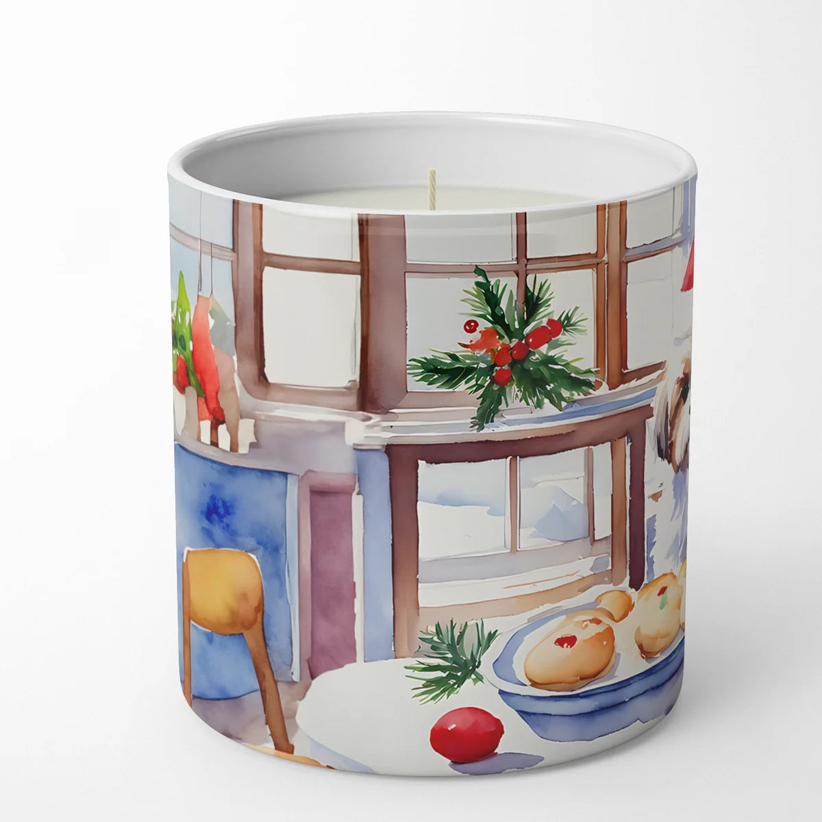 Candle with a decorative design of a kitchen scene on a white background
