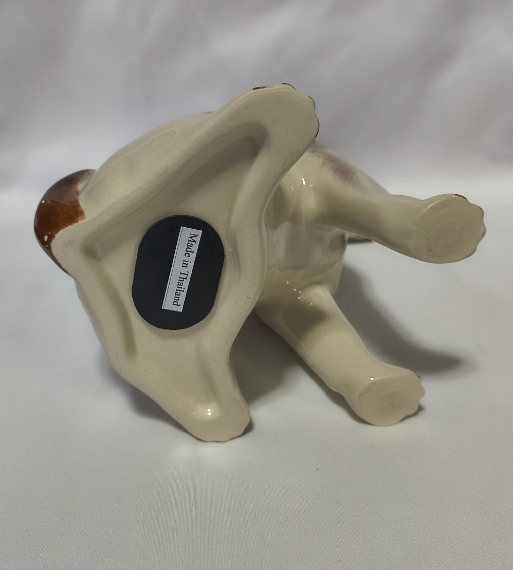 Bottom view of the Jack Russel ceramic bank.