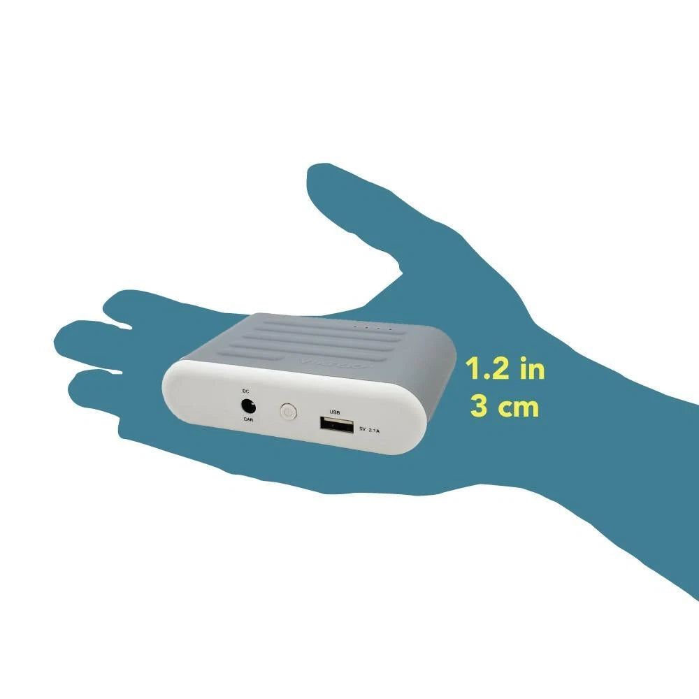 Small electronic device held in a hand with dimensions indicated