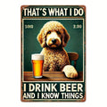 A rectangular metal-style novelty sign with rounded corners and visible screw holes, featuring a cartoon dog sitting at a table with a glass of beer and the text 'THAT'S WHAT I DO' at the top and 'I DRINK BEER AND I KNOW THINGS' at the bottom.